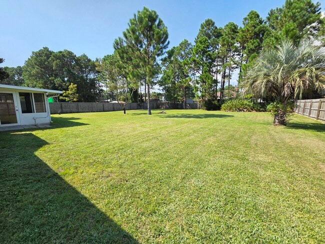 Building Photo - 7436 Woodmont Rd