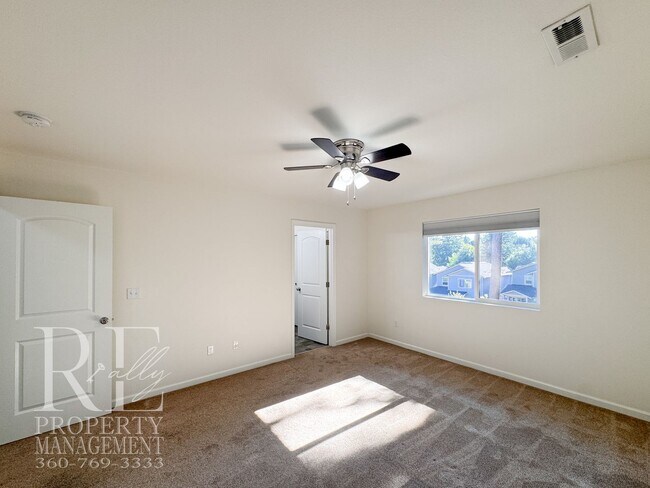 Building Photo - Spacious 3-Story Home with Flexible Living Space, Heat Pump & Private Deck Retreat