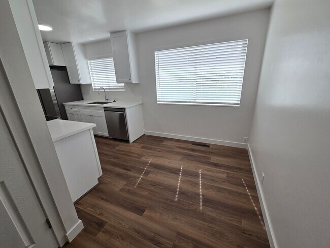 Building Photo - Remodeled 4 Bed, 2 Bath with Double Kitchen & Covered Carport