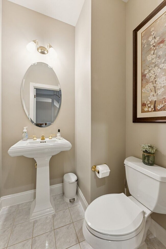 Building Photo - Discover this stunning four-level townhous...