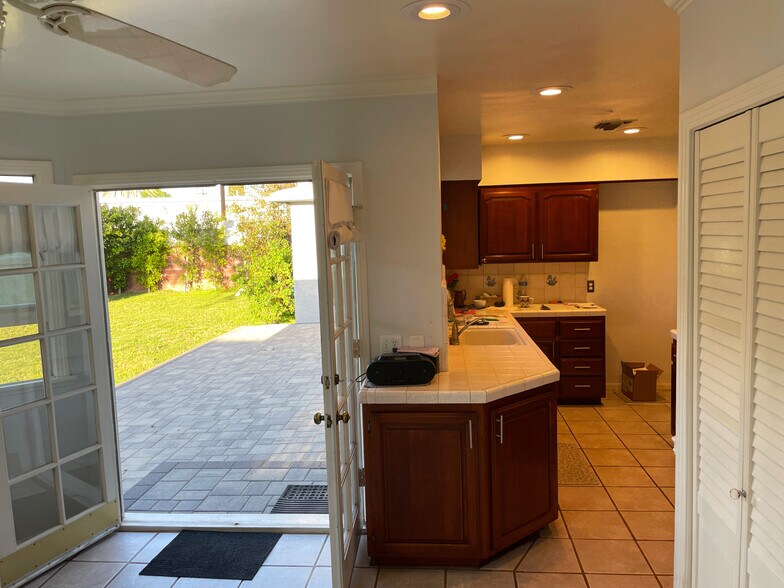 Kitchen nook to the back patio through the French door - 15341 Cohasset St