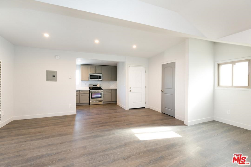 Living area facing kitchen - 130 S Hoover St