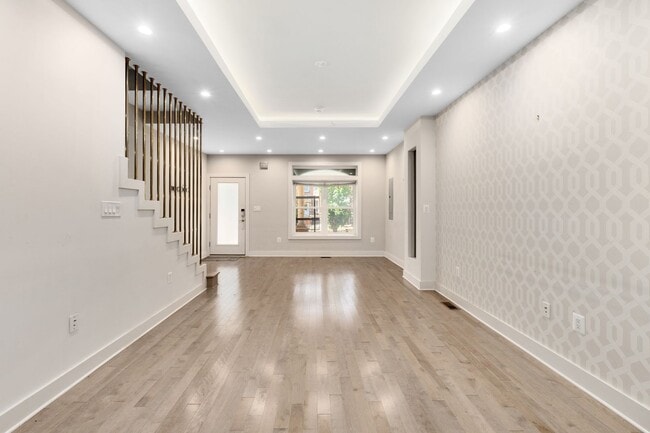 Building Photo - Experience stunning design and modern finishes in Columbia Heights!