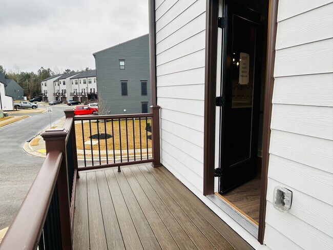 Building Photo - New Construction • 4 BR • 2 Full / 2 Half BA • End Unit Townhome in Village Town – Fayetteville’s...