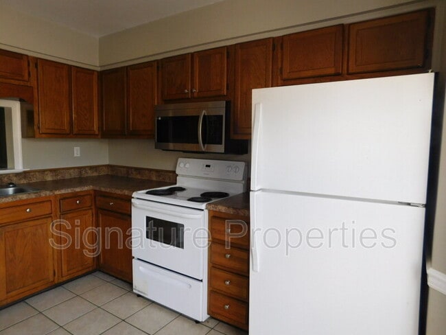 Building Photo - 5557 Old Guard Crescent