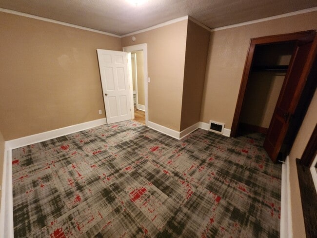 Building Photo - 4 Bedroom, 2 Bathroom home with large yard...
