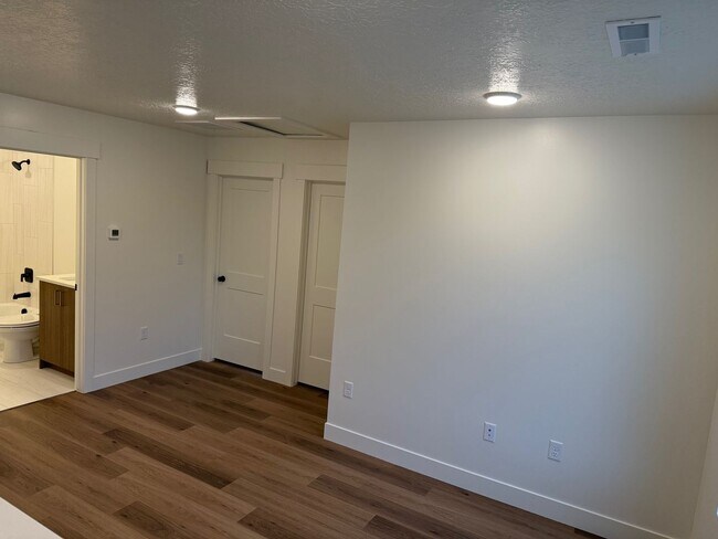 Building Photo - Half off first months rent - Beautiful townhome with 2 car garage, Central Air and Master Suite