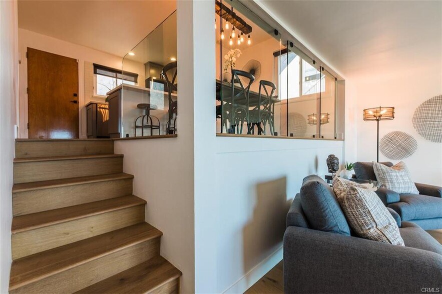 Stairs to living room - 18203 Coastline Dr