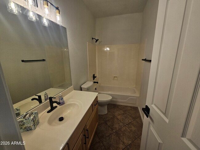 Building Photo - 8824 W Custer Ln