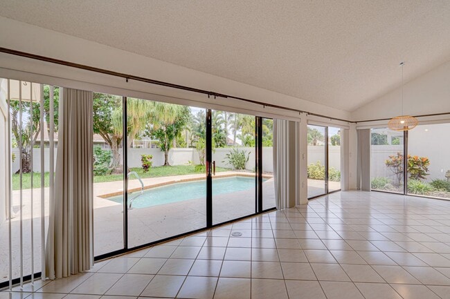 Building Photo - Luxurious 3 Bedroom Oasis with Pool and Beach Access AVAILABLE NOW!