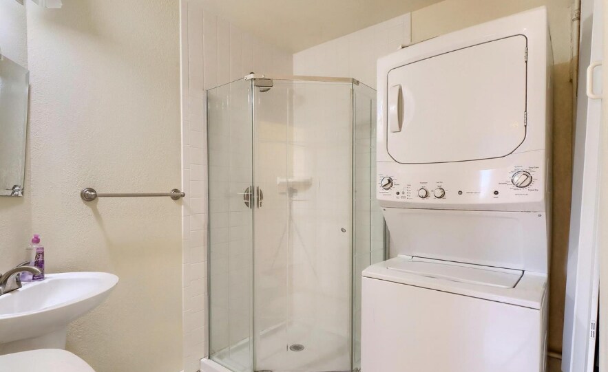 Washer and dryer have been replaced from white to black. - 4571 S Hannibal St