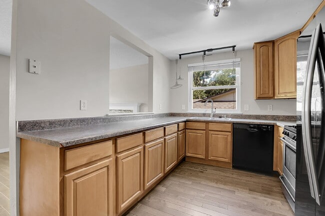 Building Photo - $2,720.95 - 4 bed, 2 bath, located in Aurora with attached Garage and In Unit Washer and Dryer!