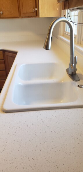 New solid surface countertops - 901 Country Club Ave