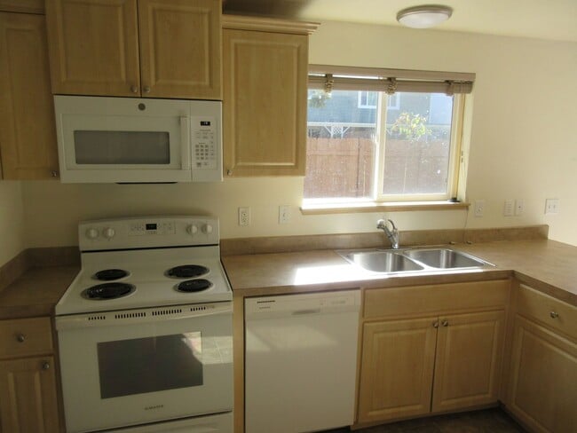Building Photo - Large Three Bedroom Home, Landscaping Prov...