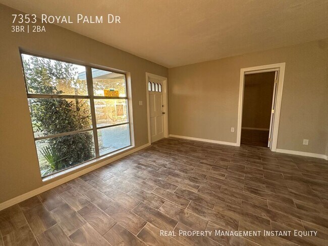 Building Photo - 7353 Royal Palm Dr