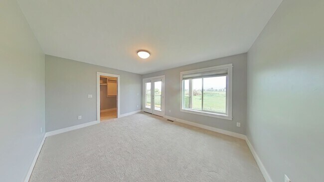 Building Photo - Stunning 3-bedroom, 2.5-bathroom condo with attached 2 stall garage!