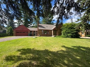 Building Photo - 3BR/1BA in Roseville Featuring A Sprawling Fenced Yard & An Attached Garage