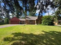 Building Photo - 3BR/1BA in Roseville Featuring A Sprawling Fenced Yard & An Attached Garage