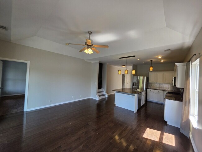 Building Photo - Lakefront 3BR/3BA with Water Views, Garage & Covered Deck