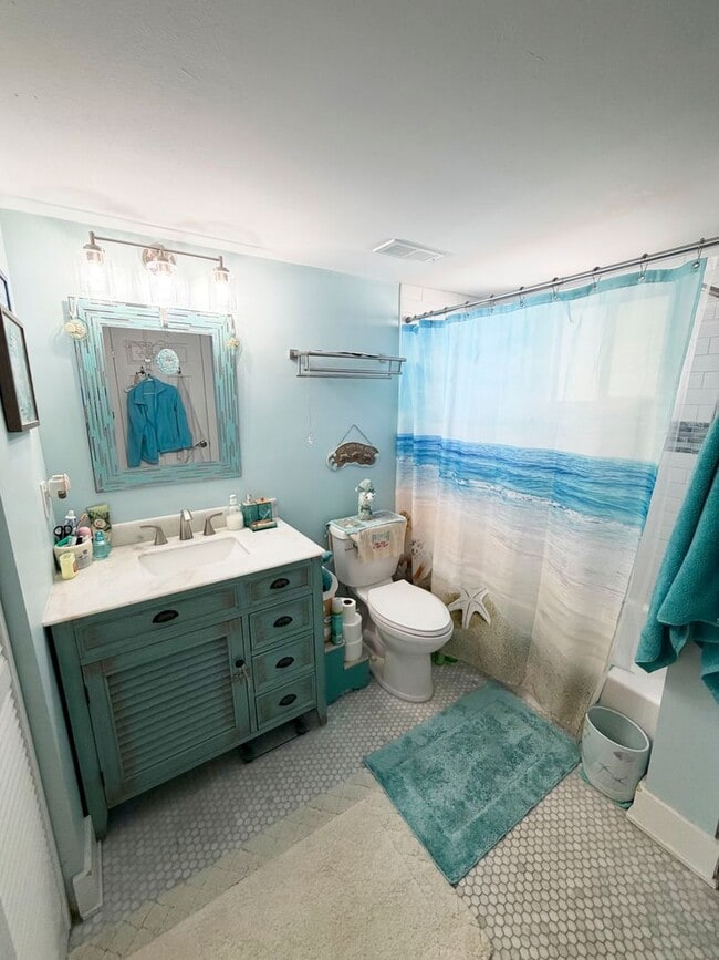 Building Photo - Beautifully Renovated, Fully Furnished Beach Condo just a short walk from the ocean.