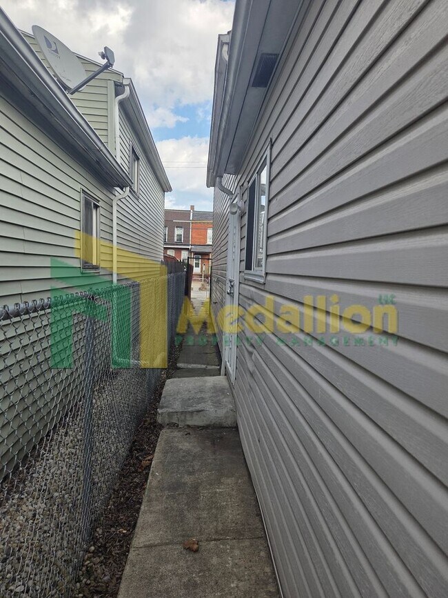 Building Photo - Updated 5-Bedroom Home with Finished Basement and Fenced Yard