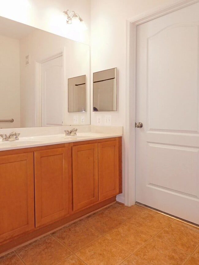 Building Photo - Pet Friendly Condo with Private Balcony and 1 Car Garage