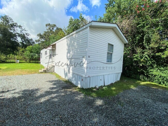 Building Photo - Affordable 3-Bedroom Mobile Home in Sulphur – Central AC & Private Lot