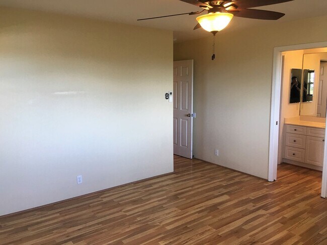 Building Photo - Available now: A 3 bedroom, 2 bath home features open concept floor plan for entertaining and a 2...