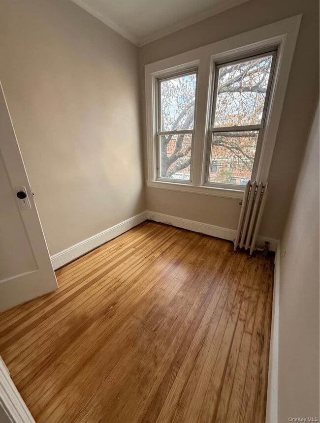 Building Photo - 81-16 Dongan Ave