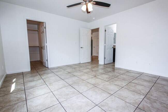 Building Photo - Three Bedroom Duplex