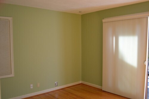 Bedroom with sliding door access to backyard. - 9121 SW 35th Ave