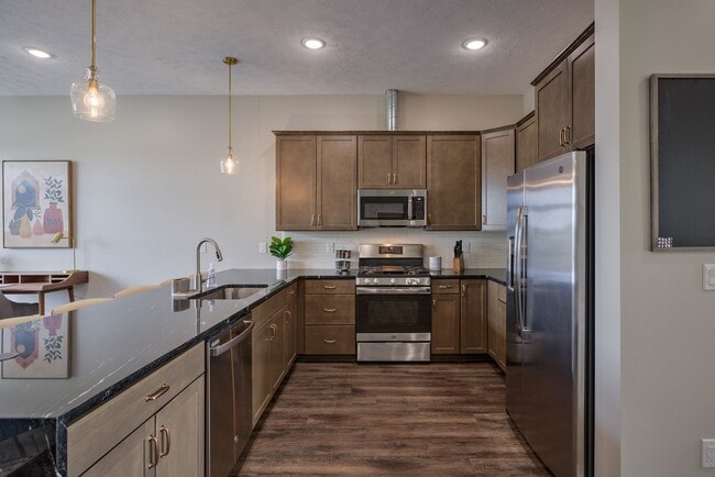 Building Photo - Modern 3BR Retreat | Penthouse + Skyline Views - Fully Furnished Option