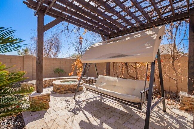 Building Photo - 4935 W Yearling Rd