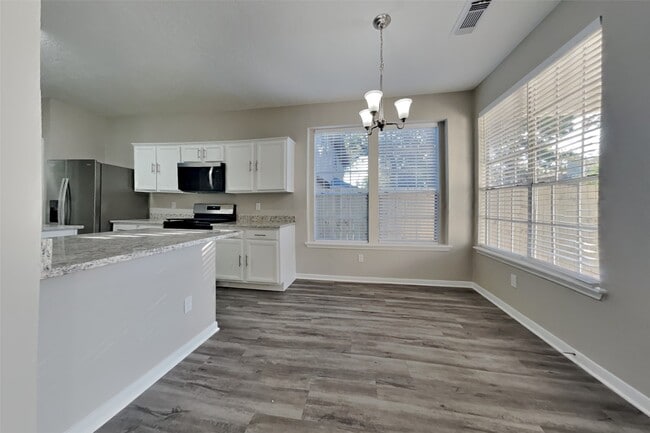 Building Photo - 7022 Echo Pines Dr