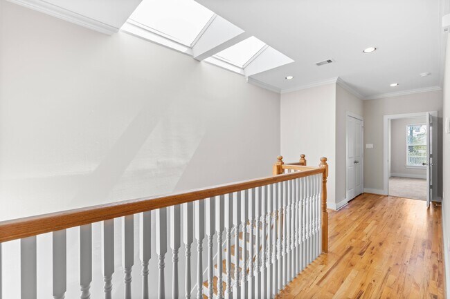 Second floor hallway and laundry closet in back - 1221 W 23rd St