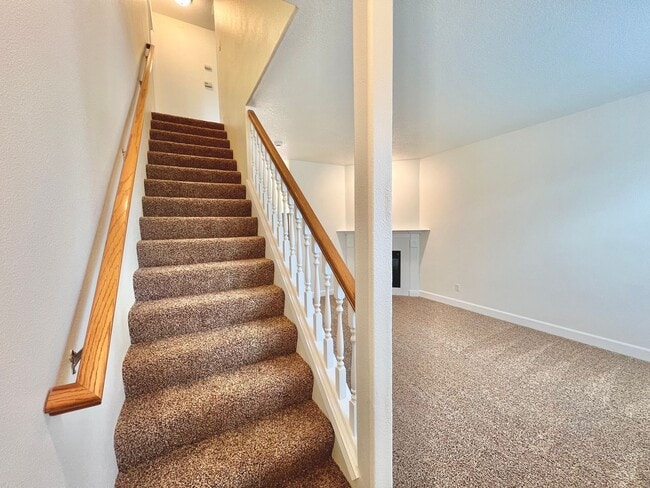 Building Photo - NEWLY RENOVATED! Spacious 2-Bedroom Townhome in a Charming Cul-de-Sac!
