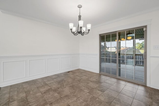 Building Photo - Pet Friendly Four Bedroom with Bonus!