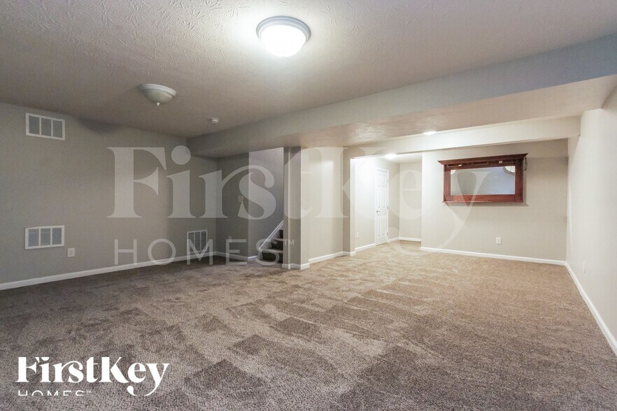 Building Photo - 8305 Wheatfield Dr