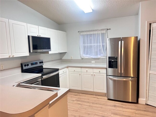 Building Photo - 8825 Grand Palms Cir