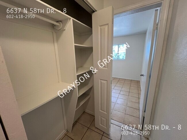 Building Photo - 6637 N 58th Dr