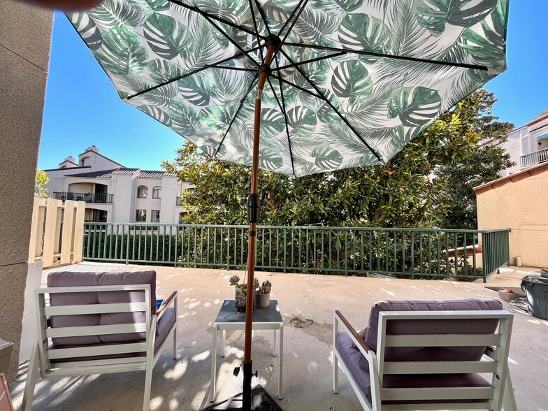 The Magnolia tree helps make this a mostly secluded terrace - 4201 Via Marisol