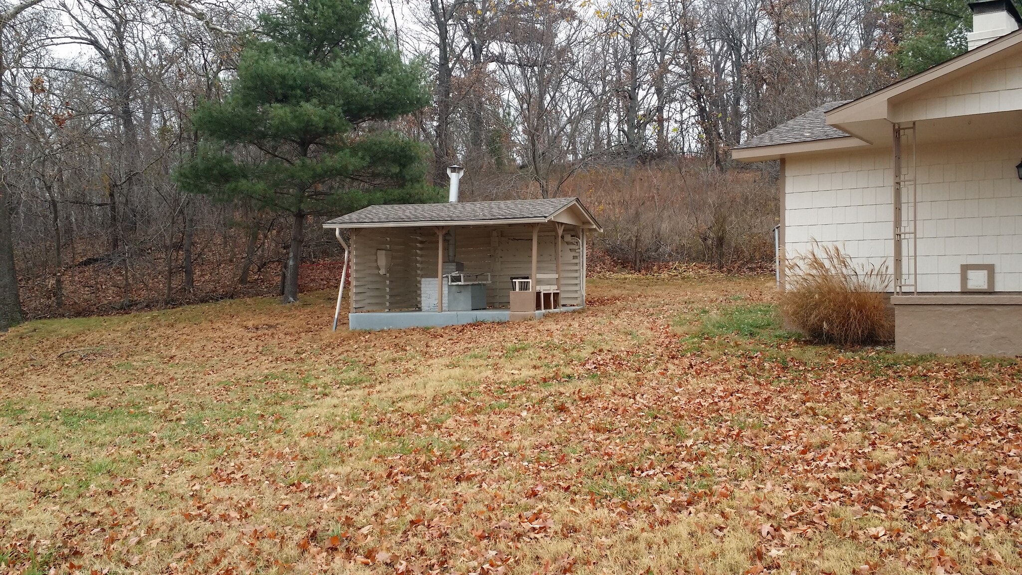 Outdoor space with electricity and built-in grill. - 5235 Highway NN