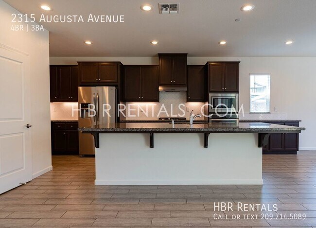 Building Photo - Ellis Community - Four Bedroom Home Over 3...