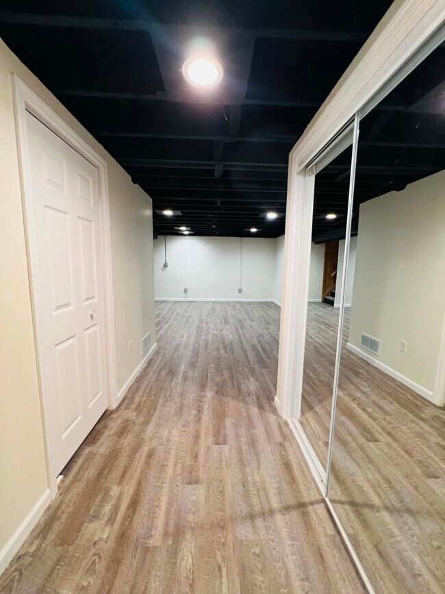 Building Photo - Spacious 4-Bedroom Home with Finished Basement & Attached Garage