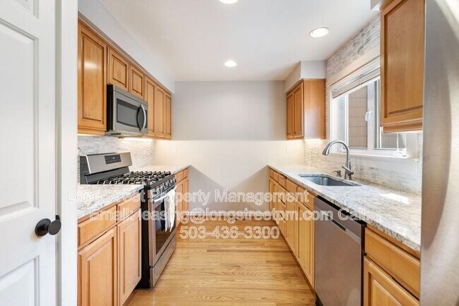 Building Photo - 10247 NW Village Heights Dr