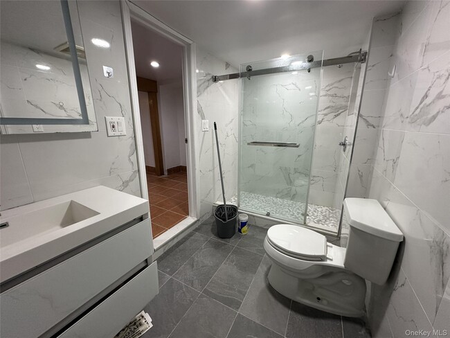 Building Photo - 168-04 35th Ave