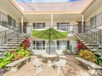 Building Photo - Beautiful 2B 1BA Condo w/ Reserved Parking and Wall AC!