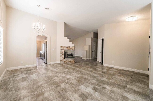 Building Photo - STUNNING 3 Bedroom Home with a 3 CAR GARAGE & RV PARKING!