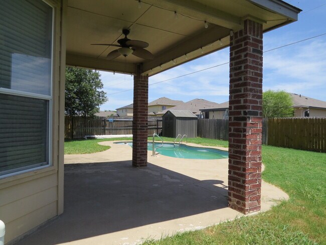 Building Photo - "Spacious 5-Bedroom Oasis with Pool on Gri...