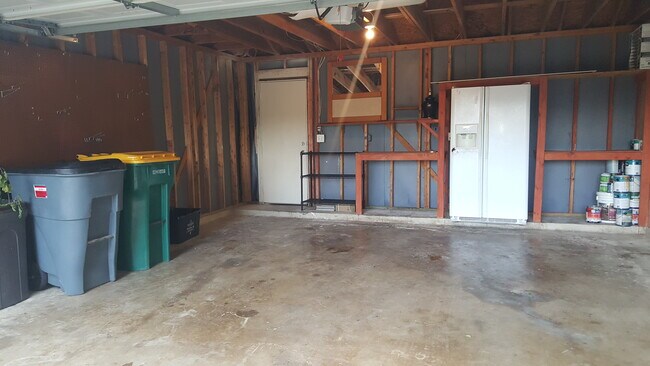 Car Garage * Two car garage. * Custom workshop space in garage with numerous built-ins. * New garag - 23631 Twisting Falls Drive